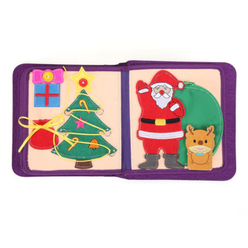 Märchenwelten Quiet Book Weihnachts-Doppelseite: links Tannenbaum mit gelber Schnur zum Fädeln von Schmuck (Zuckerstange, Stern, Glocke) und Geschenk, rechts Weihnachtsmann mit grünem Reißverschluss-Sack und Rentier – fördert Feinmotorik. Ab 1 Jahr.