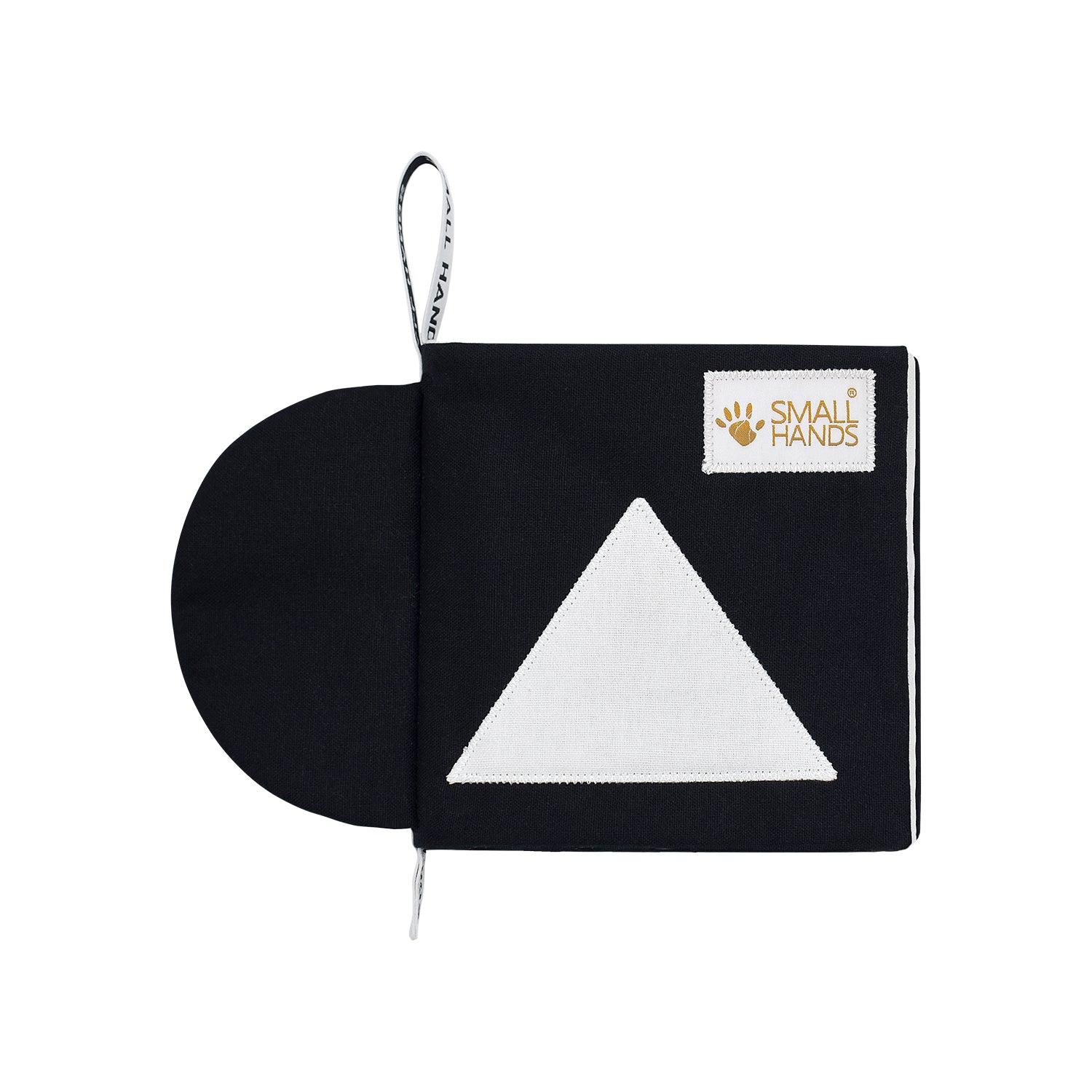 Das Small Hands Fühlbuch Formen von außen. Es zeigt die feine Stickerei und das Motiv Dreieck vorne auf dem Buch.